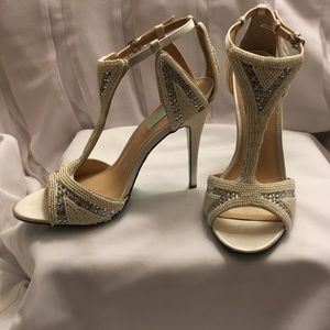 Satin peep-toe pearls & rhinestone heels.